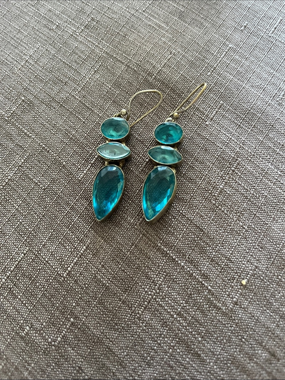 Teal stoned dangling earrings silver backing